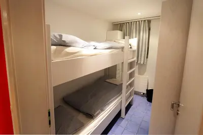 Ein Bett oder Betten in einem Zimmer der Unterkunft Nicoletta