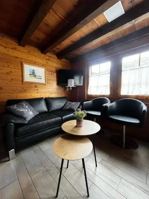 Ein Sitzbereich in der Unterkunft Chalet Heimeli