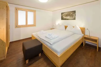 Ein Bett oder Betten in einem Zimmer der Unterkunft B&B AZapartments Lunic