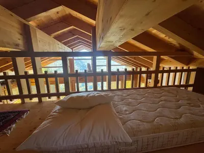 Ein Bett oder Betten in einem Zimmer der Unterkunft Chalet Les Brantes, refuge atypique a Veysonnaz