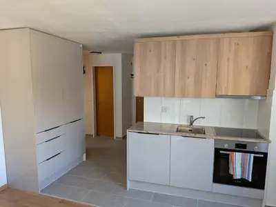 Küche/Küchenzeile in der Unterkunft Family friendly and sunny apartment in the heart of Saas Grund