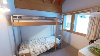 Ein Bett oder Betten in einem Zimmer der Unterkunft Doberts 6, un duplex au pied des montagnes!
