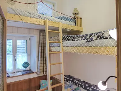 Ein Etagenbett oder Etagenbetten in einem Zimmer der Unterkunft Apartment Beim Thor Gross by Interhome