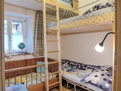 Ein Bett oder Betten in einem Zimmer der Unterkunft Apartment Beim Thor Gross by Interhome
