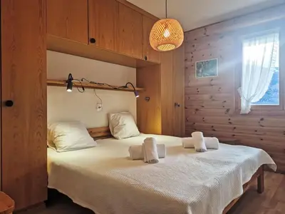 Ein Bett oder Betten in einem Zimmer der Unterkunft Apartment La Meinaz by Interhome