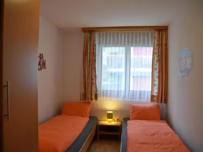 Ein Bett oder Betten in einem Zimmer der Unterkunft Apartment Dominic B2 by Interhome