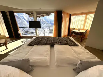 Ein Bett oder Betten in einem Zimmer der Unterkunft Apartment Waldhotel Fletschhorn Saas-Fee by Interhome