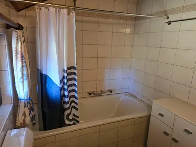 Ein Badezimmer in der Unterkunft Rustico Kevin by HolAp SA