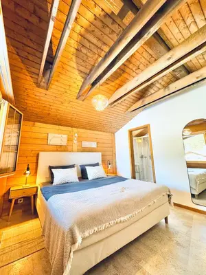 Ein Bett oder Betten in einem Zimmer der Unterkunft Bergtraum Suite