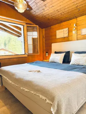Ein Bett oder Betten in einem Zimmer der Unterkunft Bergtraum Suite