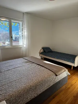 Ein Bett oder Betten in einem Zimmer der Unterkunft Appartement Niesenblick 2