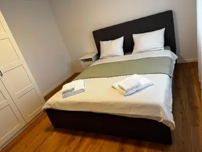 Ein Bett oder Betten in einem Zimmer der Unterkunft Appartement Niesenblick 2