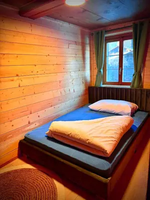 Ein Bett oder Betten in einem Zimmer der Unterkunft Ida`s Hüs