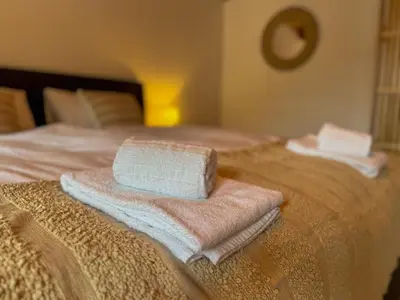 Ein Bett oder Betten in einem Zimmer der Unterkunft City Center Apartment 1