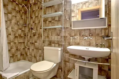 Ein Badezimmer in der Unterkunft Apartment Eigerliebe - GRIWA RENT AG