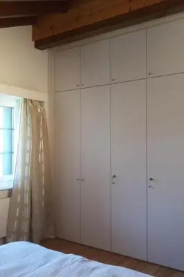 Ein Bett oder Betten in einem Zimmer der Unterkunft Apartment La Collina-Haus C- by Interhome