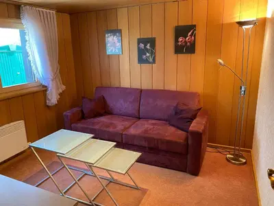 Ein Sitzbereich in der Unterkunft Holiday Home Chalet Oase by Interhome