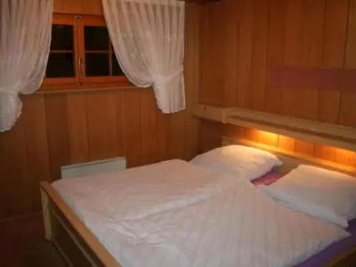 Ein Bett oder Betten in einem Zimmer der Unterkunft Holiday Home Chalet Oase by Interhome
