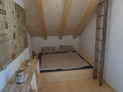 Ein Bett oder Betten in einem Zimmer der Unterkunft Holiday Home Wollhaus Oberzwirgi by Interhome