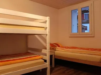 Ein Bett oder Betten in einem Zimmer der Unterkunft Apartment Adlerhorst by Interhome