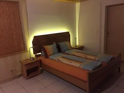 Ein Bett oder Betten in einem Zimmer der Unterkunft Apartment Haus am See by Interhome
