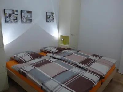 Ein Bett oder Betten in einem Zimmer der Unterkunft Apartment Casa Ninfea by Interhome