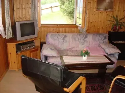 Ein Sitzbereich in der Unterkunft Apartment Chalet Bärli by Interhome