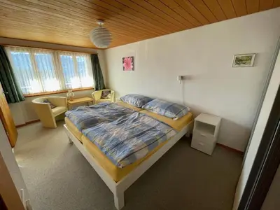 Ein Bett oder Betten in einem Zimmer der Unterkunft Apartment Chalet Hofer by Interhome
