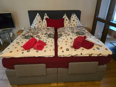 Ein Bett oder Betten in einem Zimmer der Unterkunft Apartment Haus Ahorni by Interhome