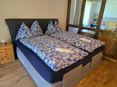 Ein Bett oder Betten in einem Zimmer der Unterkunft Apartment Haus Ahorni by Interhome