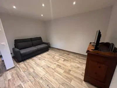 Ein Sitzbereich in der Unterkunft Studio Chez Régio à La Tour, Evolène