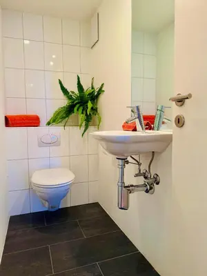 Ein Badezimmer in der Unterkunft Schweizerheim Residence 1