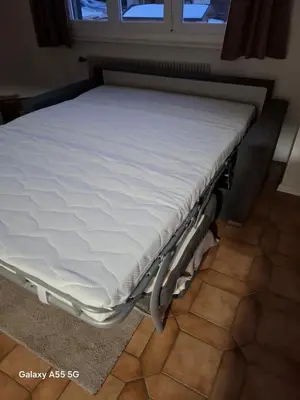 Ein Bett oder Betten in einem Zimmer der Unterkunft appartement calme et cosi à Nax