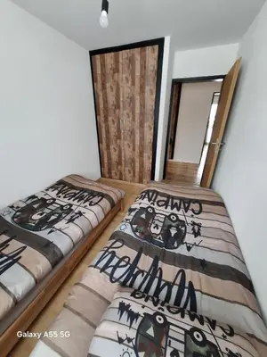 Ein Bett oder Betten in einem Zimmer der Unterkunft appartement calme et cosi à Nax
