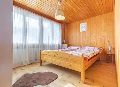 Ein Bett oder Betten in einem Zimmer der Unterkunft Sara