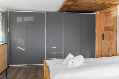 Ein Bett oder Betten in einem Zimmer der Unterkunft Historic Charming House 10 min from Crans-Montana