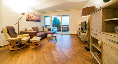Ein Sitzbereich in der Unterkunft Residenz Ambassador B13 mit Wellness-Fitness