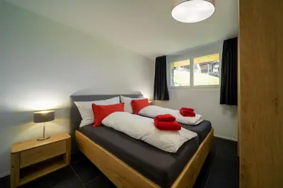Ein Bett oder Betten in einem Zimmer der Unterkunft Altishofen Apartment
