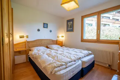 Ein Bett oder Betten in einem Zimmer der Unterkunft Ambiente B12