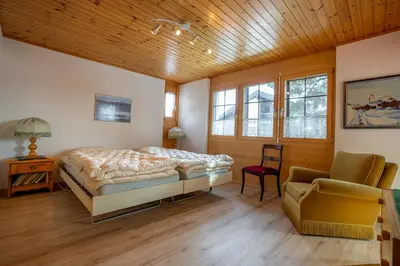Ein Bett oder Betten in einem Zimmer der Unterkunft Kleewasu Apartment