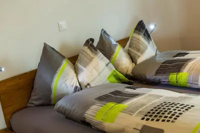 Ein Bett oder Betten in einem Zimmer der Unterkunft Riederhoru A Parterre