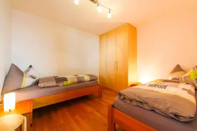 Ein Bett oder Betten in einem Zimmer der Unterkunft Riederhoru A Parterre