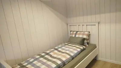 Ein Bett oder Betten in einem Zimmer der Unterkunft Historic Stationhouse – 20 Min from Interlaken
