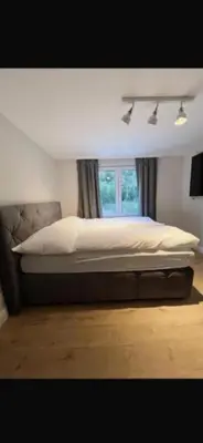 Ein Bett oder Betten in einem Zimmer der Unterkunft Home7