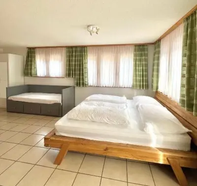Ein Bett oder Betten in einem Zimmer der Unterkunft Studio Laralax