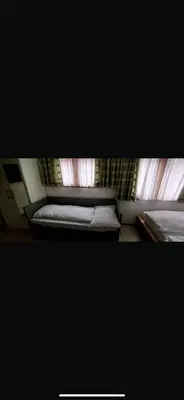 Ein Bett oder Betten in einem Zimmer der Unterkunft Studio Laralax