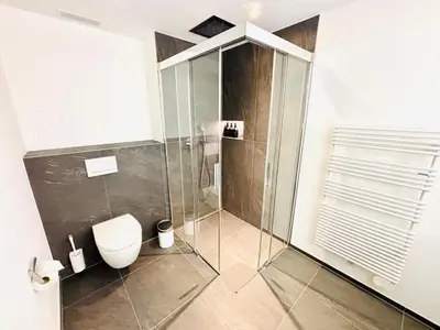 Ein Badezimmer in der Unterkunft Premium Jungfrau Apartment