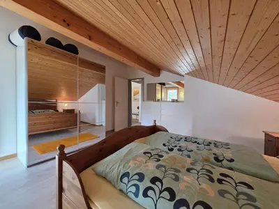 Ein Bett oder Betten in einem Zimmer der Unterkunft Vallesia Penthouse