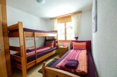 Ein Bett oder Betten in einem Zimmer der Unterkunft Luxury Family Apartment