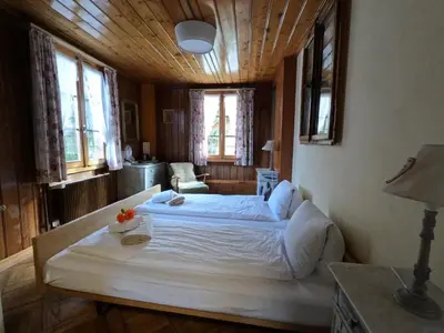 Ein Bett oder Betten in einem Zimmer der Unterkunft Edelweiss Lodge